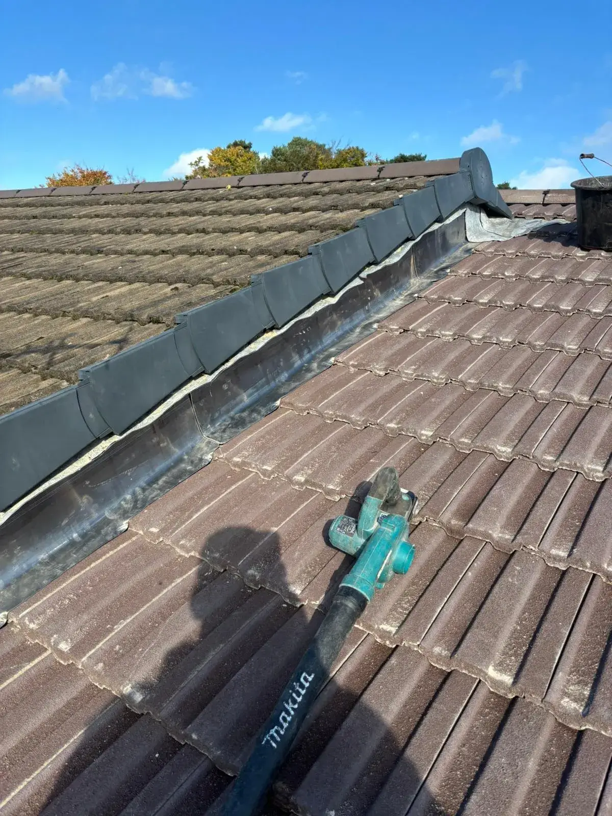 A roof that has a hammer on it.