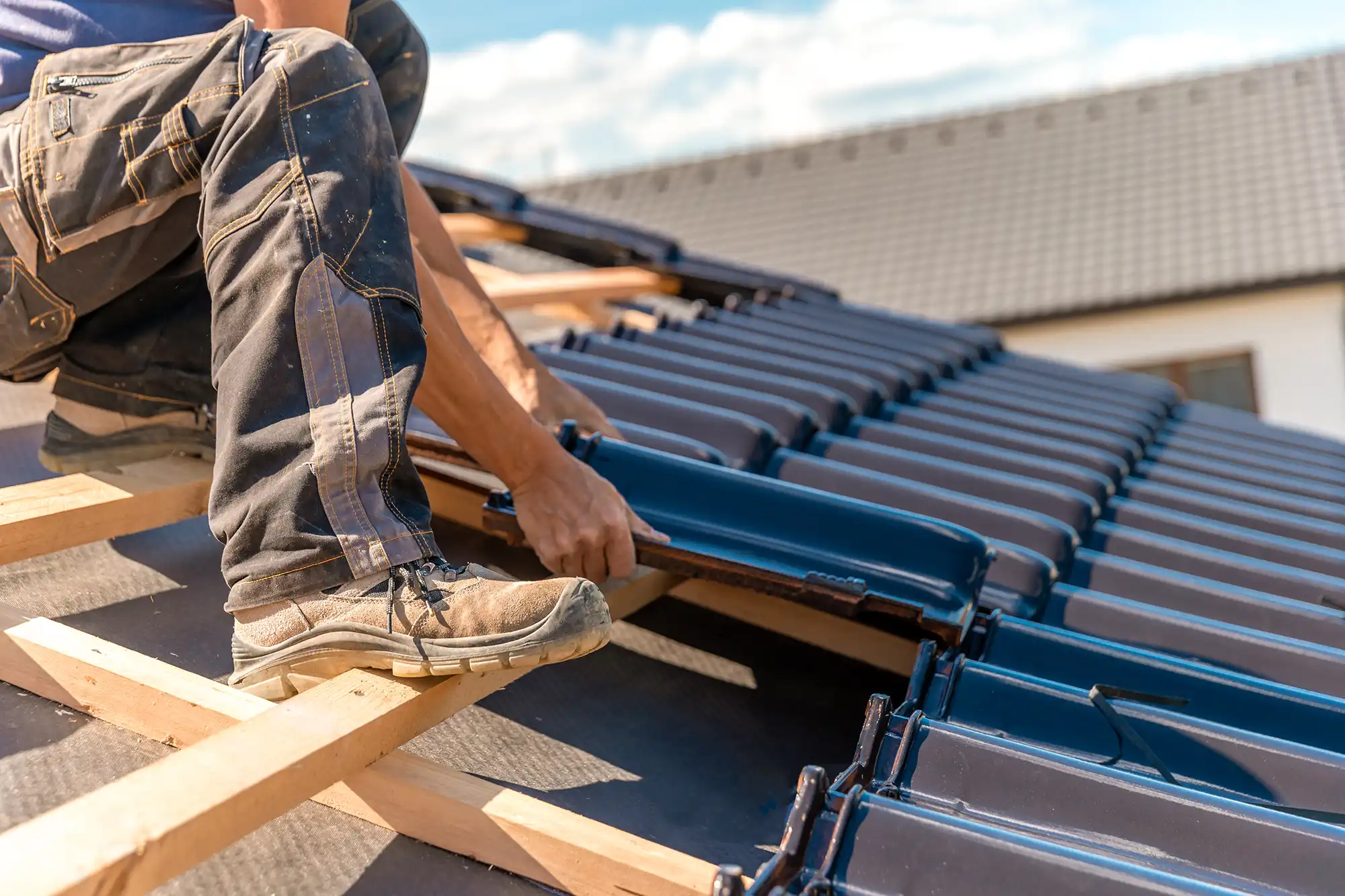 man on a roof